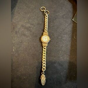 Ecclissi sterling silver link watch with gold accents.